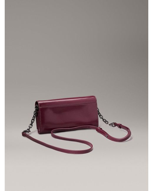 Calvin Klein Shiny Crossbody Wallet Bag in Purple Lyst UK