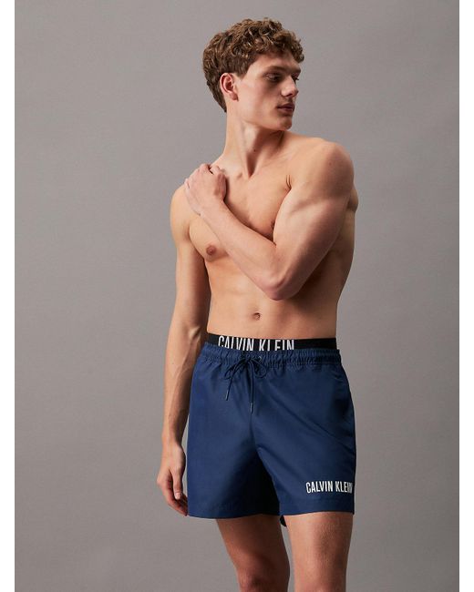 Short de bain avec double ceinture - Intense Power Calvin Klein pour homme en coloris Blue