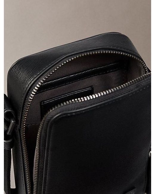 Calvin Klein Black Emblem Hardware Crossbody Phone Bag for men