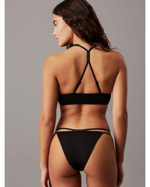 Partes de abajo de bikini tipo brasileña - CK Split Elastic Calvin Klein de color Brown