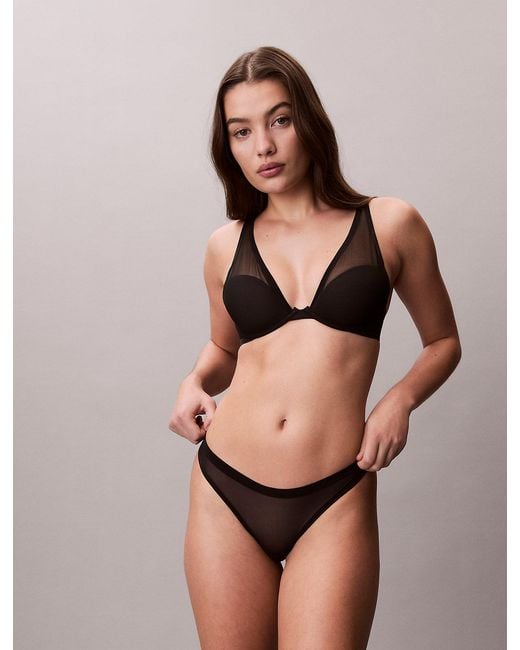 String Calvin Klein en coloris Black