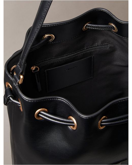 Calvin Klein Black Embossed Monogram Logo Bucket Bag