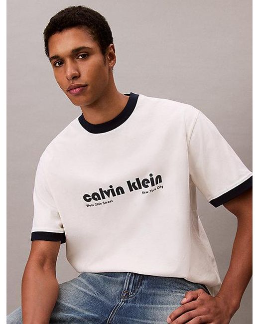 Calvin Klein Blue Jeans Logo Graphic Relaxed Ringer T-Shirt for men