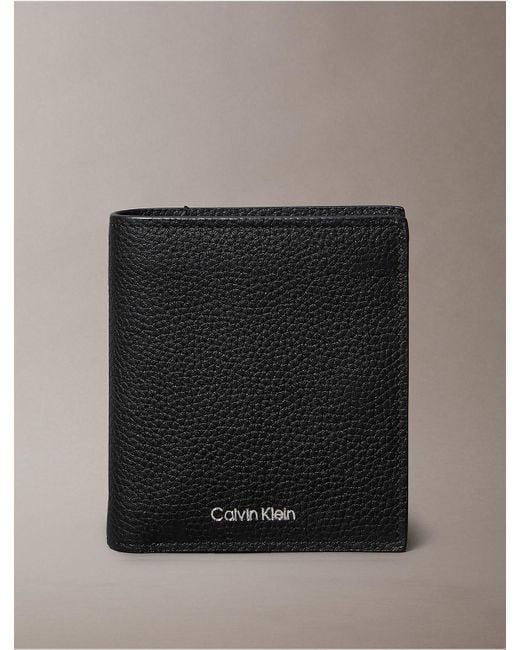 Calvin Klein Black Foil Embossed Logo Trifold Wallet + Card Case for men