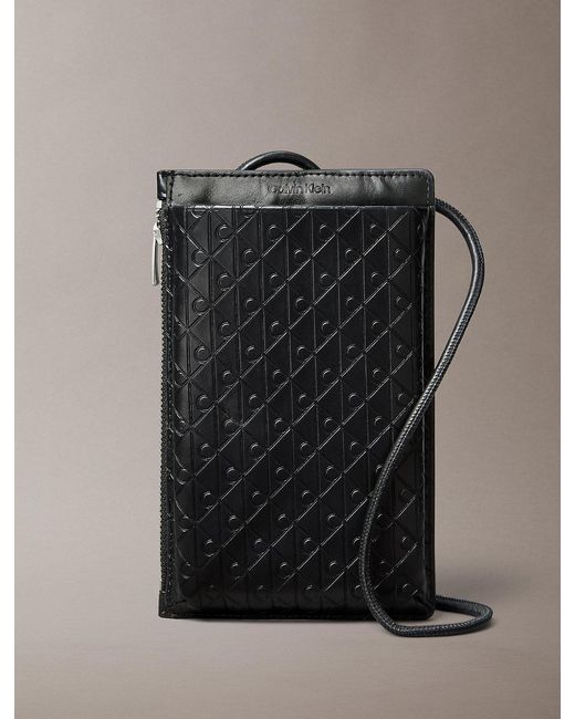 Calvin Klein Black Embossed Emblem Logo Phone Crossbody for men