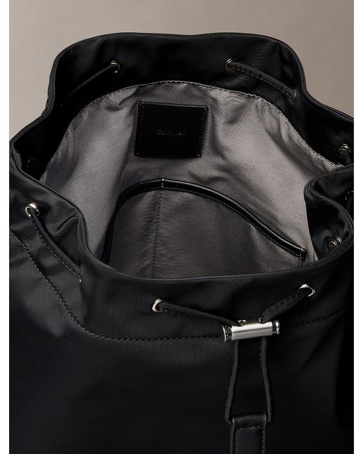 Calvin Klein Black Matte Nylon Drawstring Backpack for men