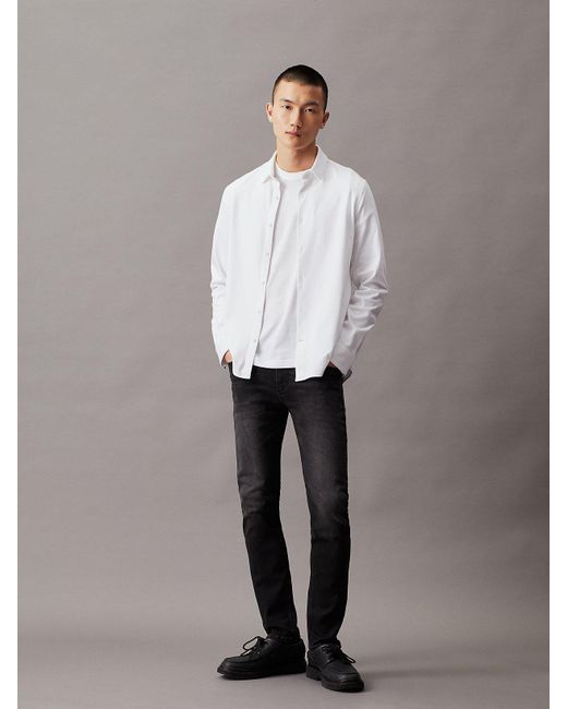 Jean Skinny Calvin Klein pour homme en coloris Black