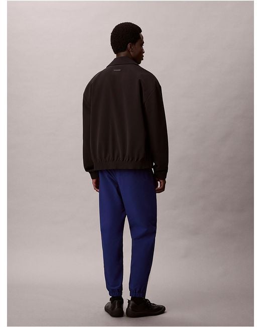 Calvin Klein Blue Tech Slim Pull-On Pants for men
