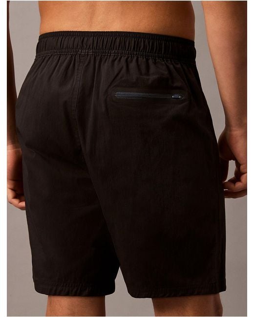 Calvin Klein Black Solid 7" Swim Shorts for men