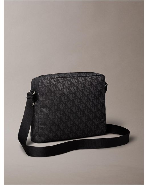 Calvin Klein Gray Calvin Klein Allover Monogram Logo Flight Bag for men