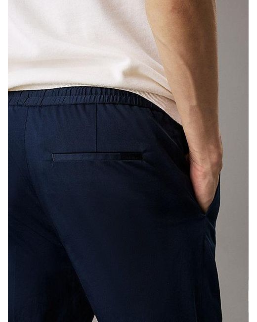 Calvin Klein Blue Tapered Jogger Trousers for men