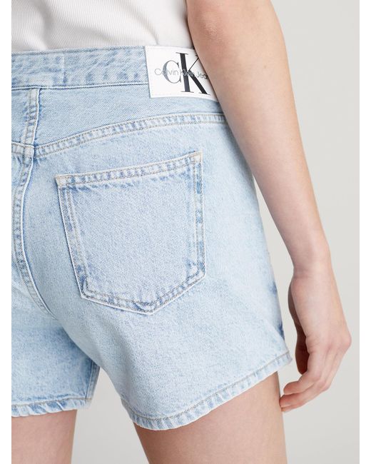 Jupe-short portefeuille en jean Calvin Klein en coloris Blue