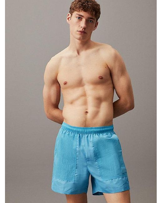 Bañador de largo medio con cordón antidesgarro Calvin Klein de hombre de color Blue