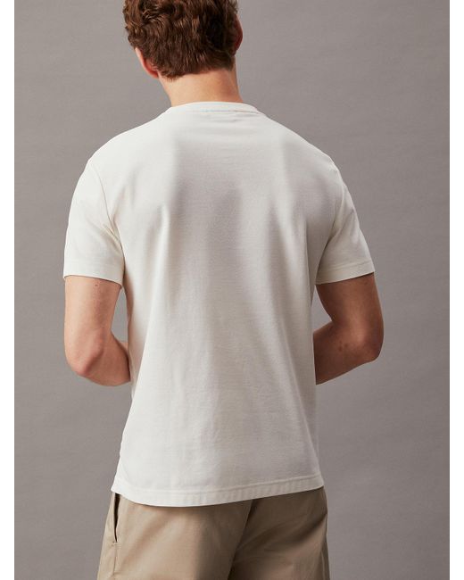T-shirt passepoilé texturé Calvin Klein pour homme en coloris White