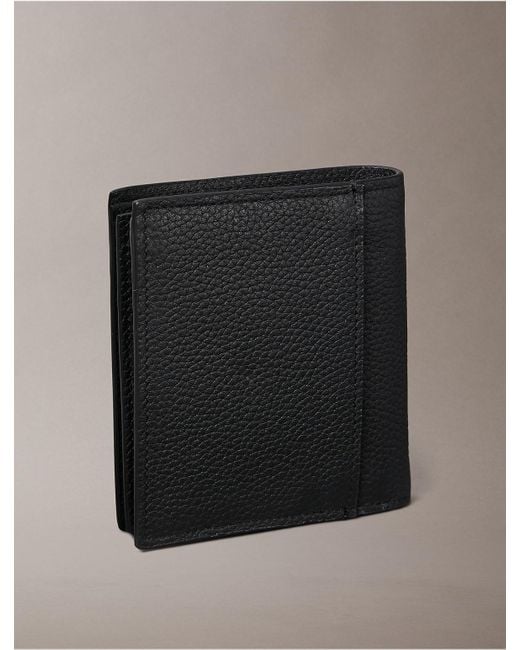 Calvin Klein Black Foil Embossed Logo Trifold Wallet + Card Case for men