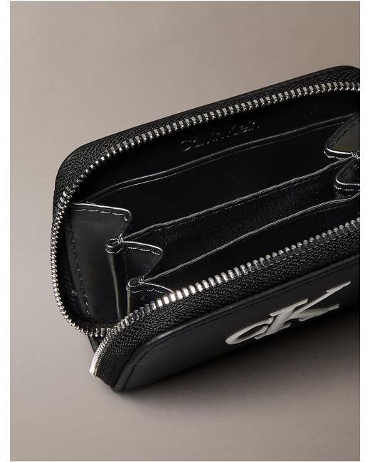 Calvin Klein Black Embossed Monogram Zip Wallet