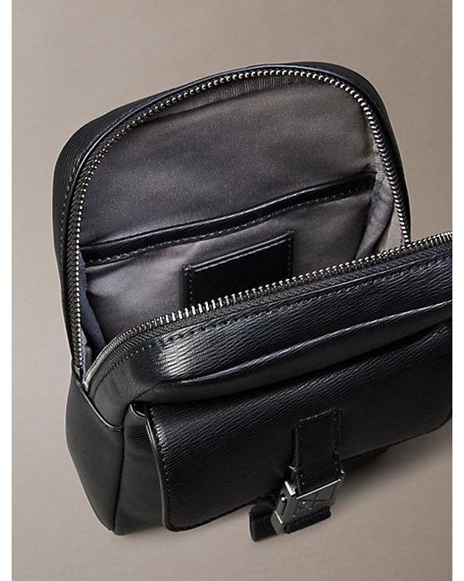 Calvin Klein Black Emblem Logo Sling Bag for men