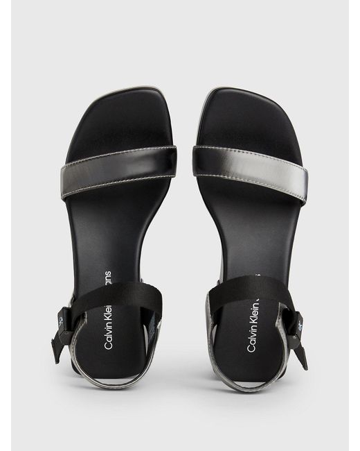 Sandales plateforme métallisées Calvin Klein en coloris Black