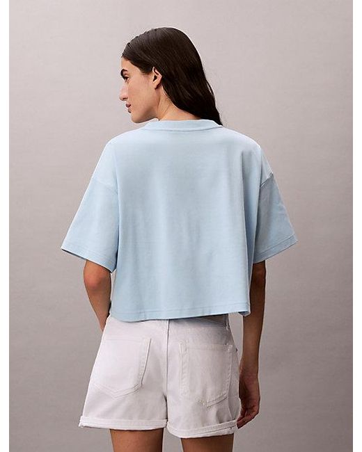 Calvin Klein Blue Logo Graphic Boxy Cropped T-Shirt