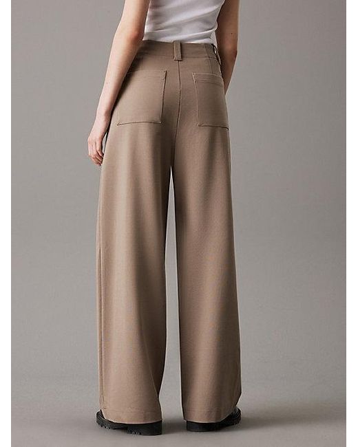 Calvin Klein Broek Met Wijde Pijpen Van Milano Jersey in het Brown