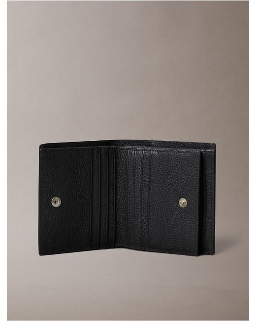 Calvin Klein Black Foil Embossed Logo Trifold Wallet + Card Case for men