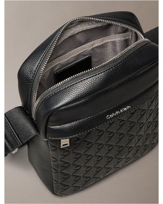Calvin Klein Black Embossed Allover Monogram Reporter Bag for men