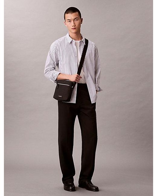 Calvin Klein Black Embossed Woven Reporter Bag for men