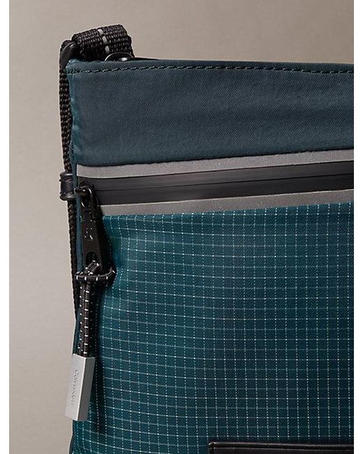 Calvin Klein Blue Striped Utility Zip Flat Pack for men