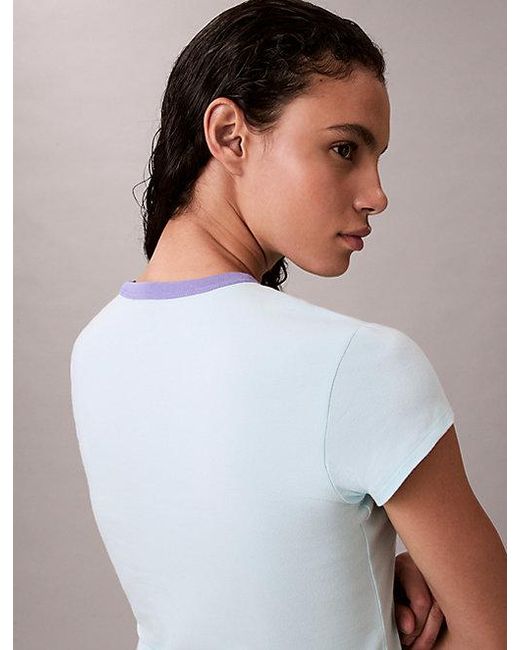 Calvin Klein White Jeans Logo Graphic Baby Tee