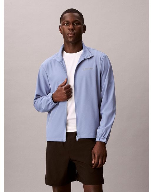 Calvin Klein Blue Performance Zip-Up Windbreaker for men