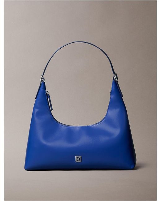 Calvin Klein Blue Monogram Logo Emblem Leather Shoulder Bag
