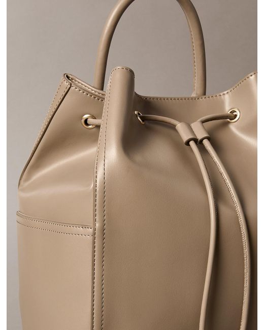 Calvin Klein Natural Monogram Drawstring Backpack