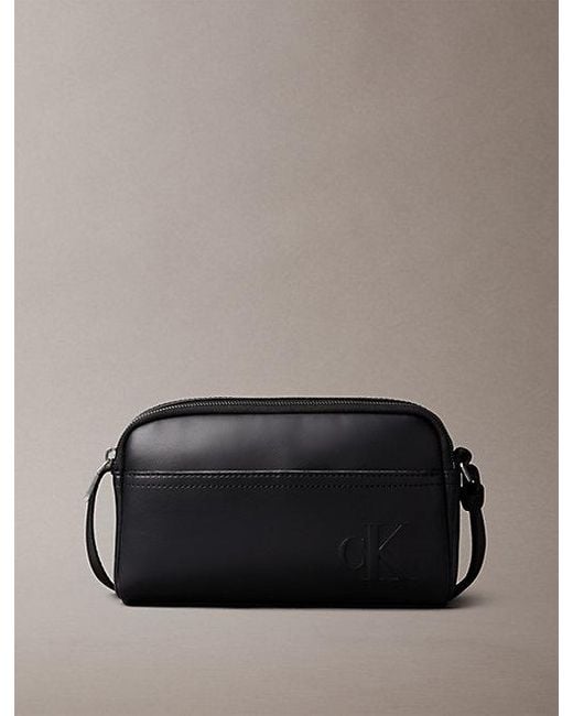 Calvin Klein Black Embossed Monogram Logo Camera Bag for men
