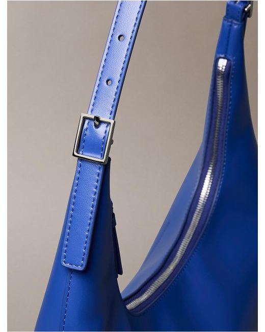 Calvin Klein Blue Monogram Logo Emblem Leather Shoulder Bag