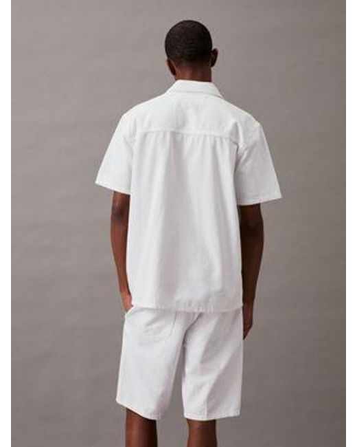 Camisa denim de manga corta Calvin Klein de hombre de color White
