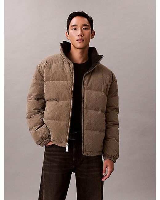 Calvin Klein Multicolor Jeans Allover Emblem Logo Reversible Puffer Jacket for men