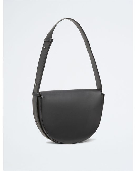 Calvin Klein Elemental Saddle Bag in Black Lyst