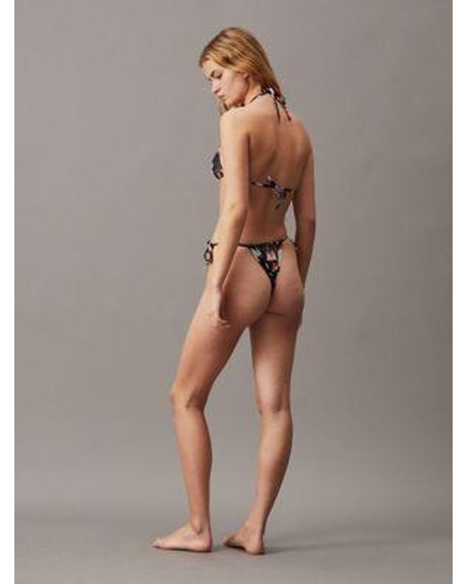 Calvin Klein Bikinibroekje Met Strikbandjes - Ck Monogram Foil in het Black