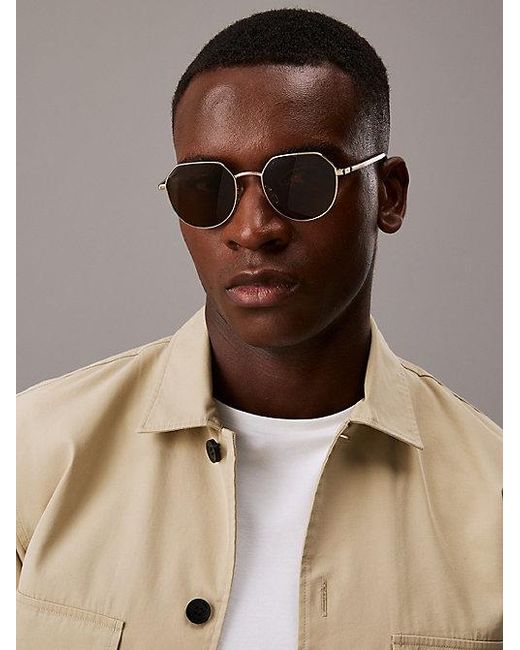 Calvin Klein Metallic Round Sunglasses