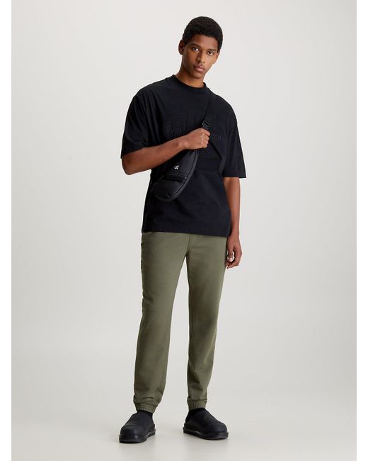 Pantalon de jogging skinny en tissu éponge avec insigne Calvin Klein pour homme en coloris Green