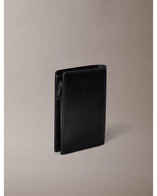 Calvin Klein Black Embossed Monogram Bifold Wallet for men