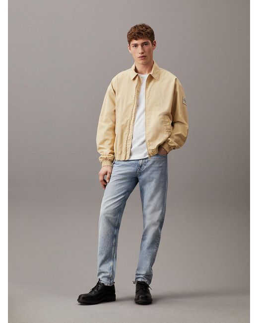 Jean regular tapered Calvin Klein pour homme en coloris Gray