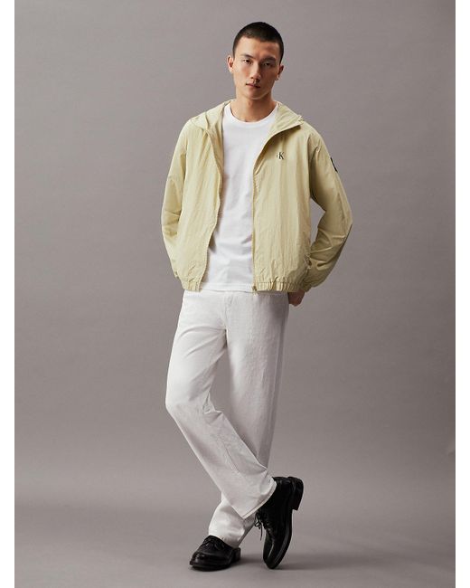Coupe-vent à capuche relaxed en nylon Calvin Klein pour homme en coloris Natural