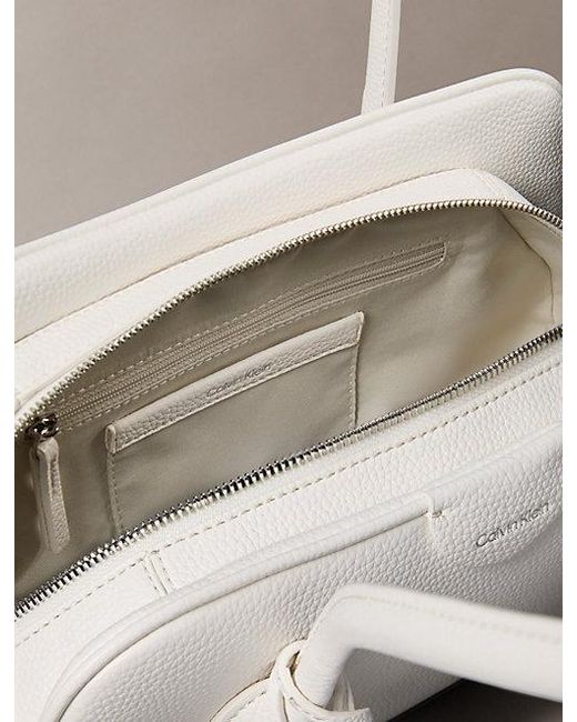 Calvin Klein Natural Emblem Logo Pebble Shoulder Bag