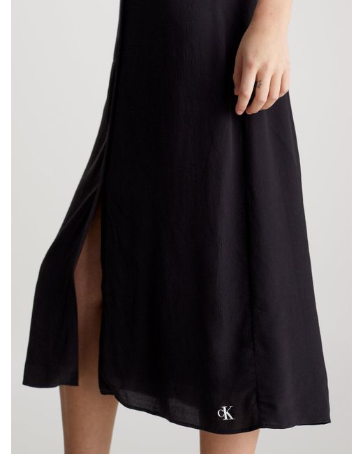Robe longueur midi entièrement boutonnée en mousseline Calvin Klein en coloris Black