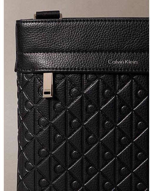 Calvin Klein Black Embossed Emblem Logo Flat Pack for men