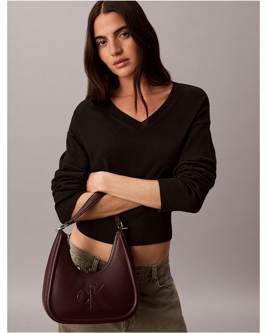 Calvin Klein Multicolor Embossed Monogram Crescent Bag