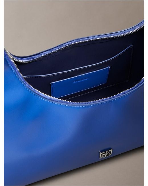 Calvin Klein Blue Monogram Logo Emblem Leather Shoulder Bag