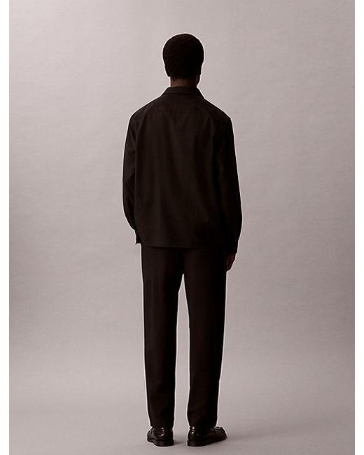 Calvin Klein Black Comfort Knit Tapered Trousers for men
