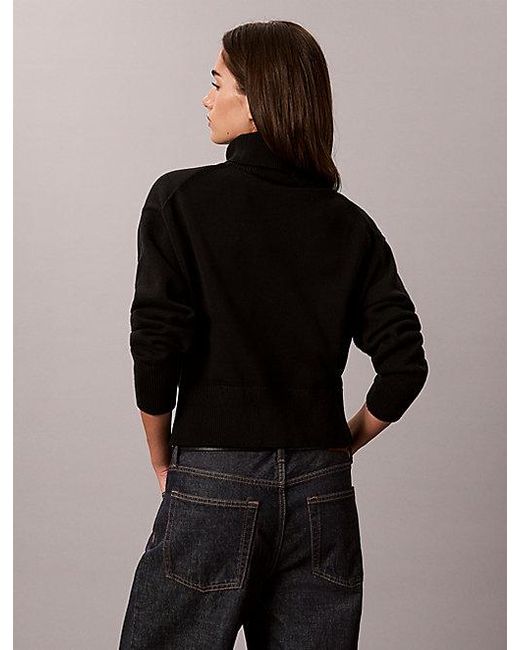 Calvin Klein Black Jeans Monologo Turtleneck Jumper